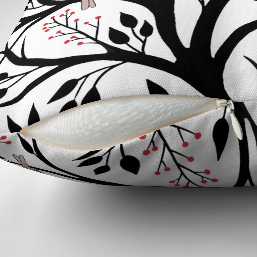 Decorative throw pillow featuring a tranquil winter forest scene with birds and berries in black, red, and white.