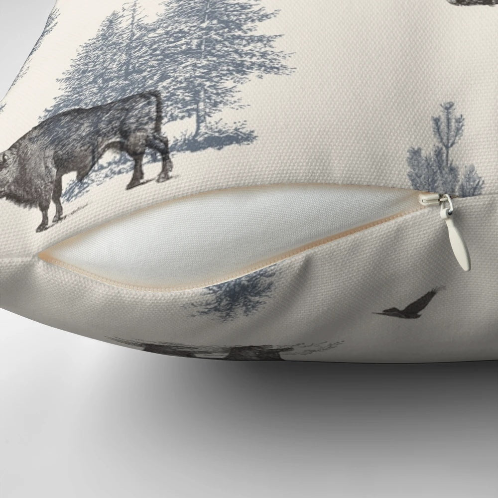 Decorative winter pillow featuring an illustration of woodland animals like foxes, bears, and birds in a snowy forest scene.