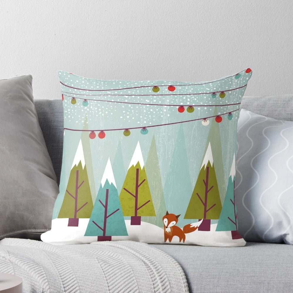 Plush winter pillow featuring a snowy forest scene with a cute fox and holiday-inspired colors