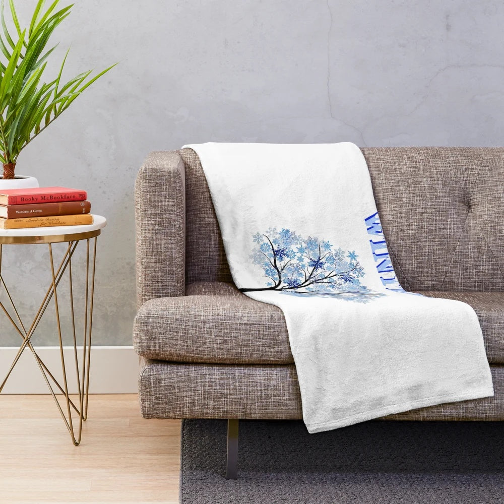 Cozy winter plush blanket with stylized polygon mountain design