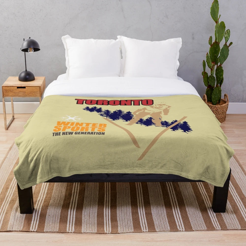 Cozy plush blanket with winter sports design