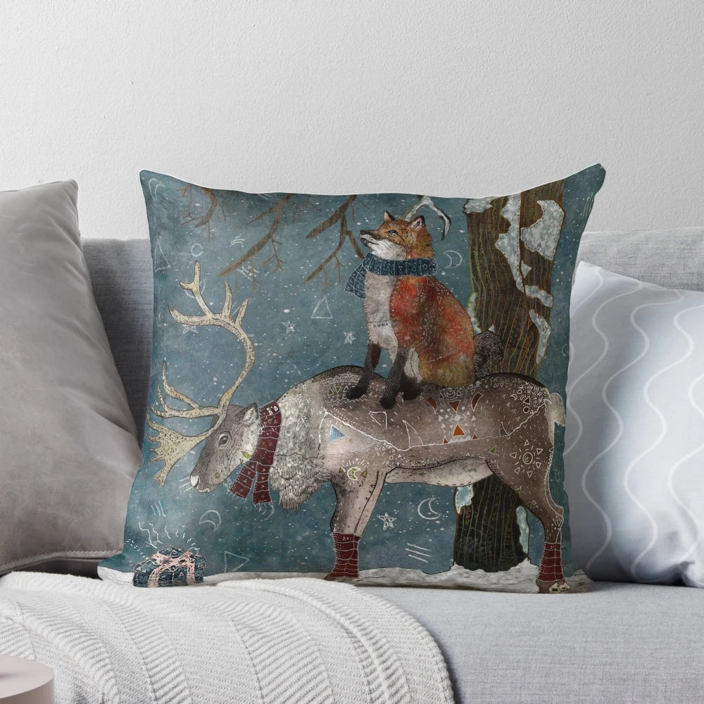 Soft, plush pillow featuring a snowy winter forest landscape with foxes