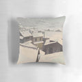 Cozy winter town landscape with snow-covered houses on a Pillow