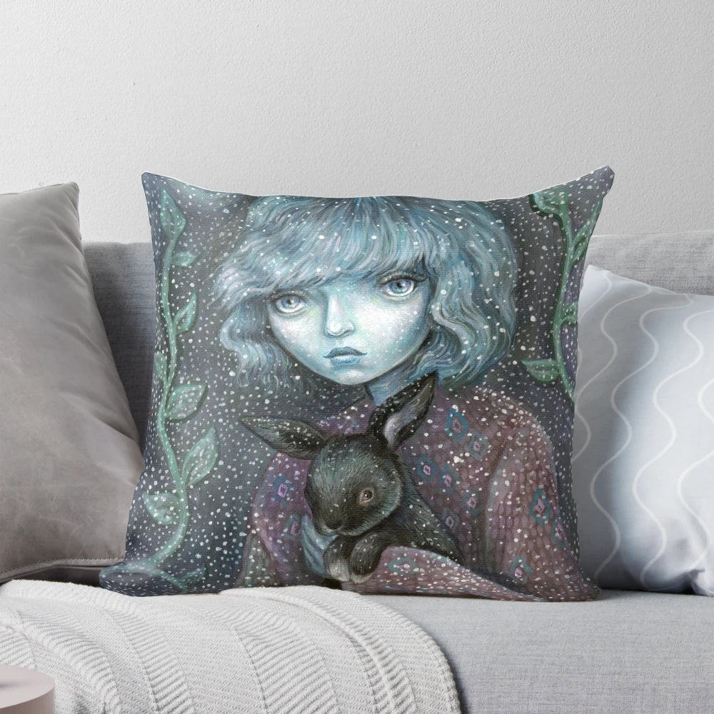 Soft, plush winter-themed pillow with a cute bunny design in shades of blue