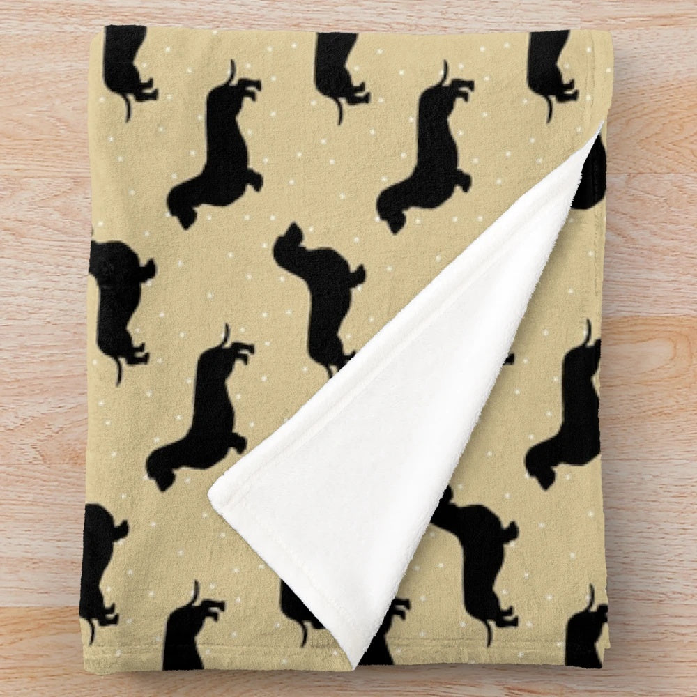 Soft and cuddly wire hair dachshund plush blanket with a charming sausage dog pattern