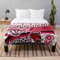 Soft and plush blanket in Wisconsin-inspired colors and patterns