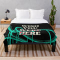 Soft and comfortable "Wish You Were Here" plush blanket featuring music-inspired design