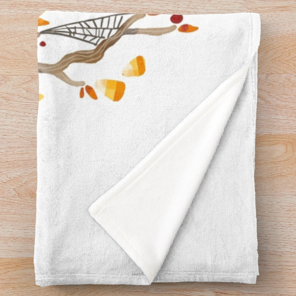 Cozy plush blanket with witch-themed design for fall and Halloween