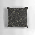 Black and beige pillow featuring a witch-themed design, perfect for adding a touch of spooky magic to your home.