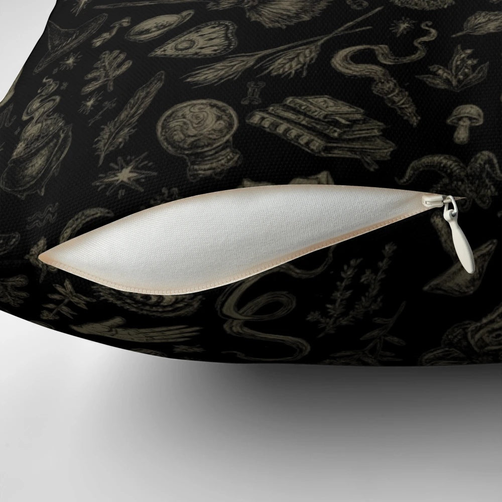 Black and beige pillow featuring a witch-themed design, perfect for adding a touch of spooky magic to your home.