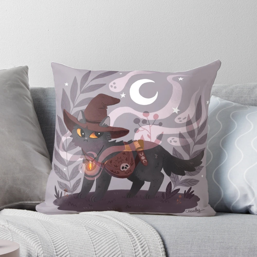 Soft, plush pillow with a witchy, magical design featuring a black cat, moon, and witch hat on a dark background
