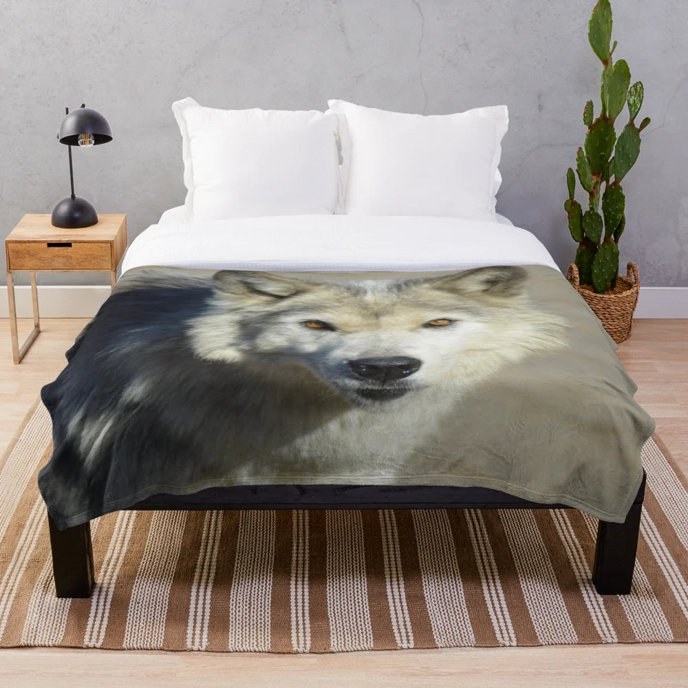 Soft and cuddly plush blanket with a wolf design, perfect for nature enthusiasts
