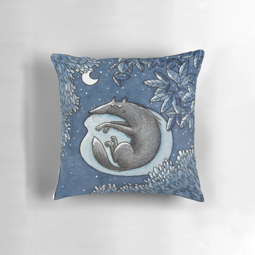 A plush, nature-inspired pillow featuring a wolf design against a starry night sky background.