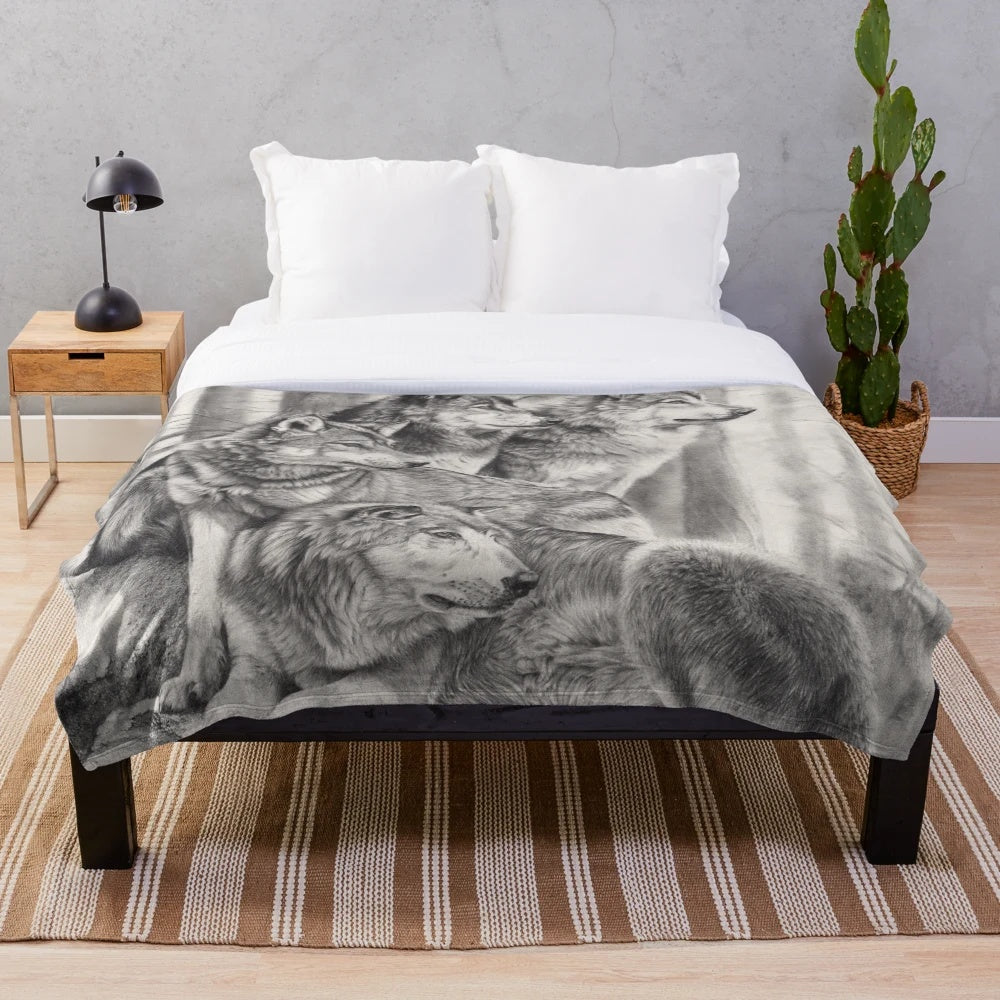 Soft and cuddly wolf plush blanket featuring a monochrome pencil drawing of a timber wolf in a forest landscape