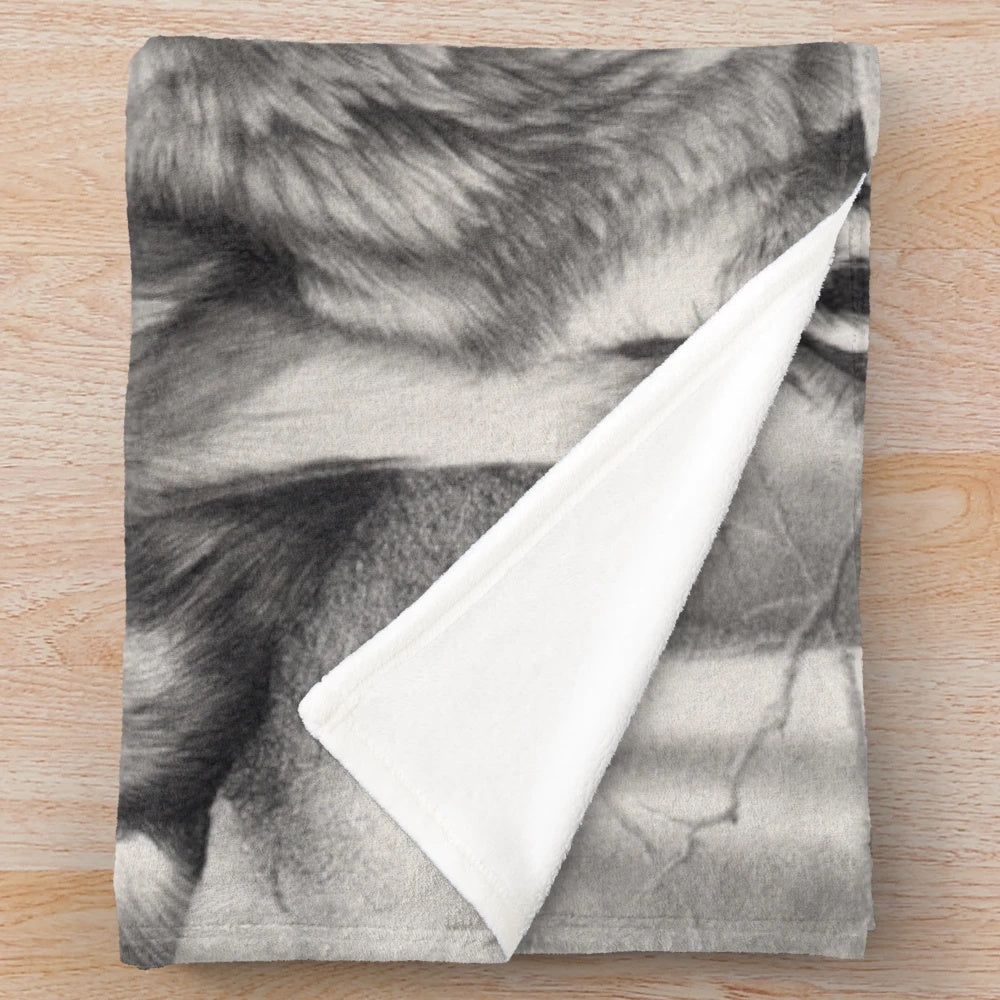Soft and cuddly wolf plush blanket featuring a monochrome pencil drawing of a timber wolf in a forest landscape