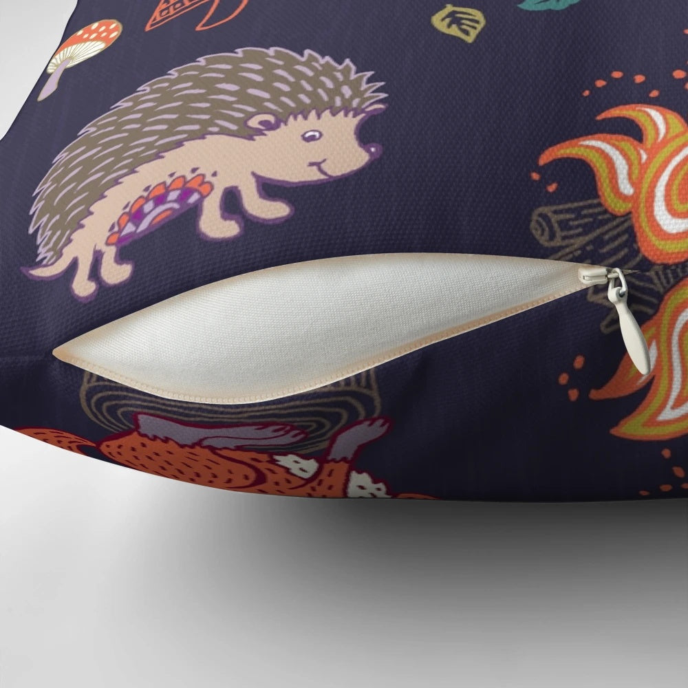 A plush pillow featuring a whimsical design of woodland animals like foxes, hedgehogs, and owls in a camping scene.