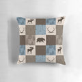 Decorative blue, brown, and beige patchwork pillow with woodland animal designs
