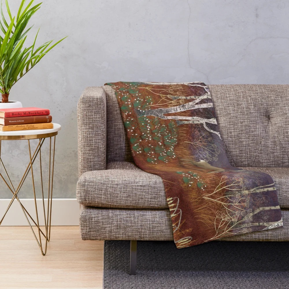 Heralds of Spring Plush Blanket featuring deer, owls, and floral elements in a woodland landscape