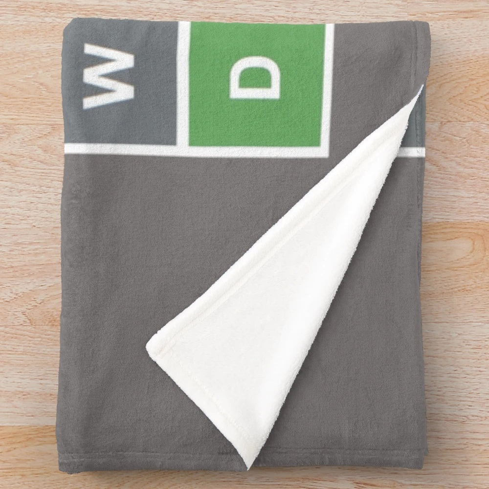 Wordle-themed plush blanket with green, yellow, and grey squares