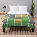 Wordle plush blanket with colorful game tiles