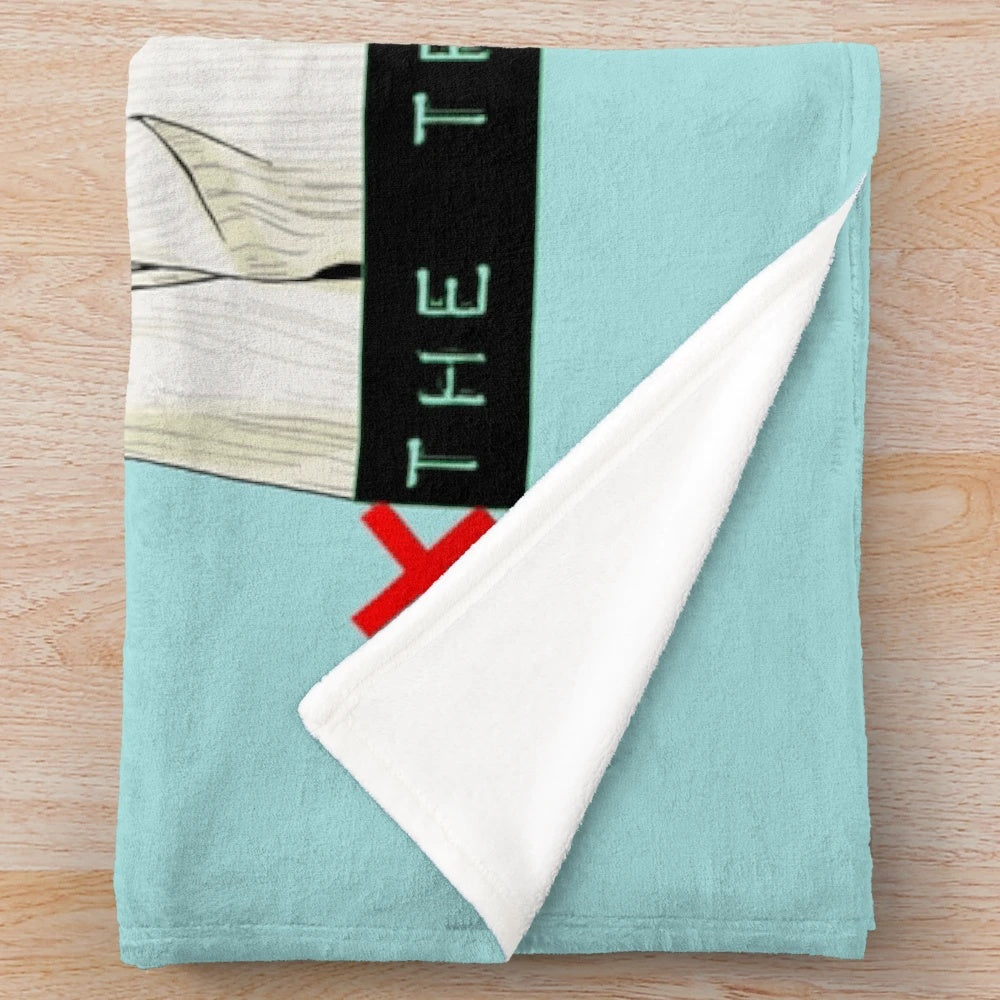 X-Files inspired plush blanket featuring "The Truth is Out There" design
