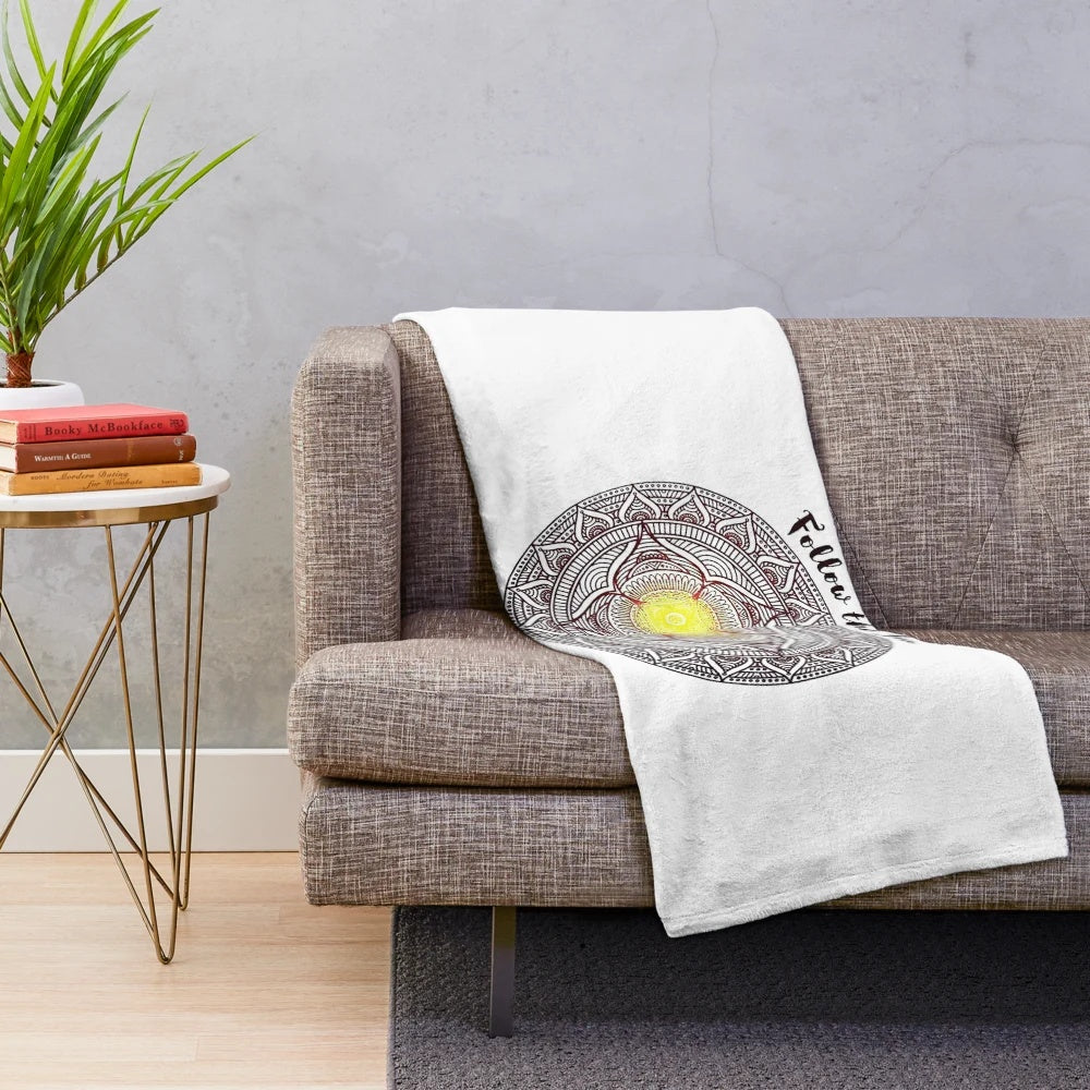 Xavier Rudd inspired plush blanket featuring the "Follow the Sun" design