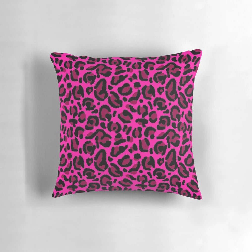 A soft and plush hot pink leopard print pillow, perfect for adding a retro y2k vibe to your home decor.