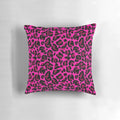 A soft and plush hot pink leopard print pillow, perfect for adding a retro y2k vibe to your home decor.