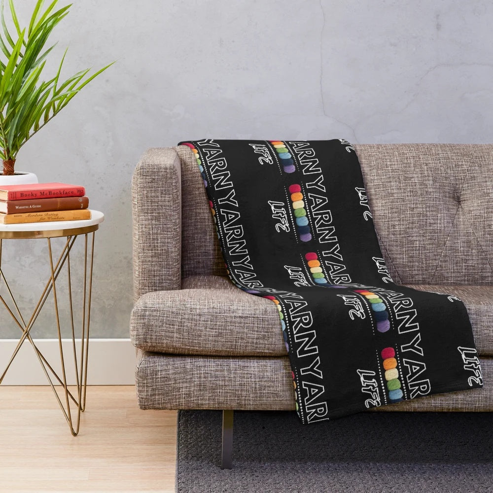 Soft, plush blanket made with yarn for crafters and hobbyists