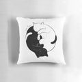Peaceful black and white cat pillow with yin yang design