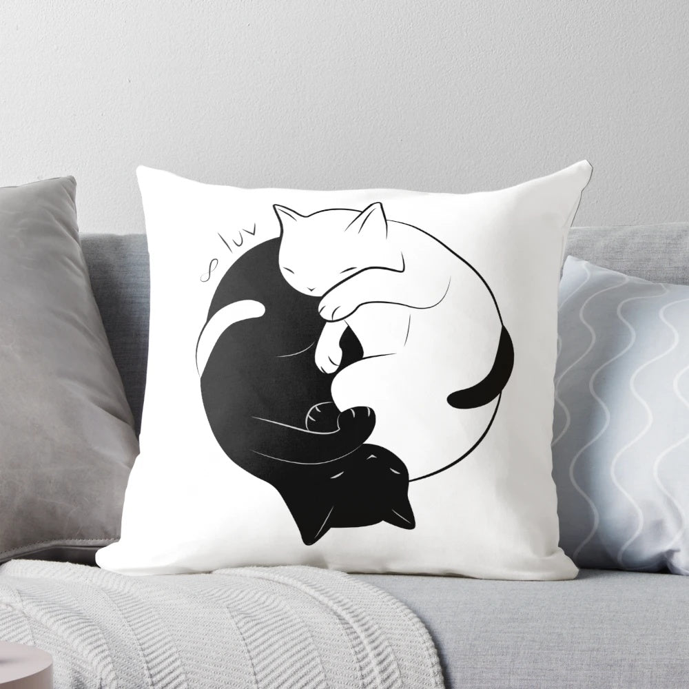 Peaceful black and white cat pillow with yin yang design