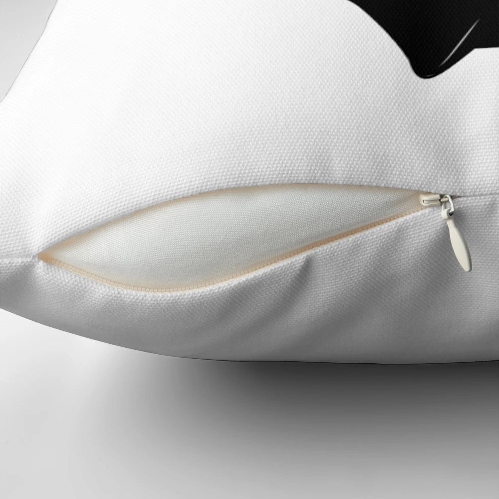 Peaceful black and white cat pillow with yin yang design