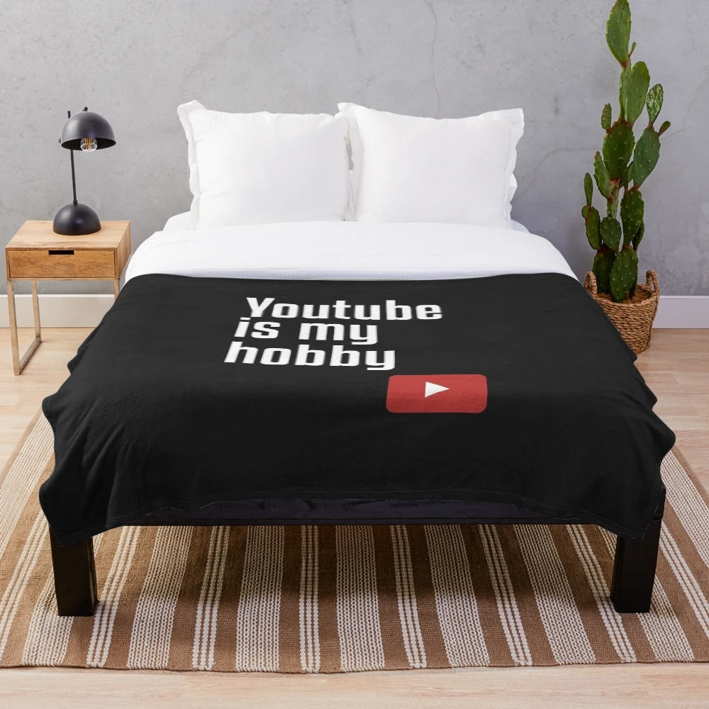 Plush blanket featuring the text "YouTube Is My Hobby