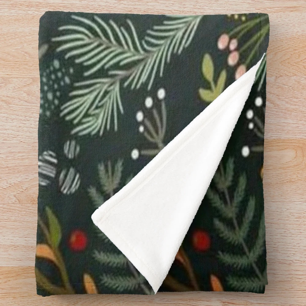 Yuletide pattern plush blanket with pine tree design