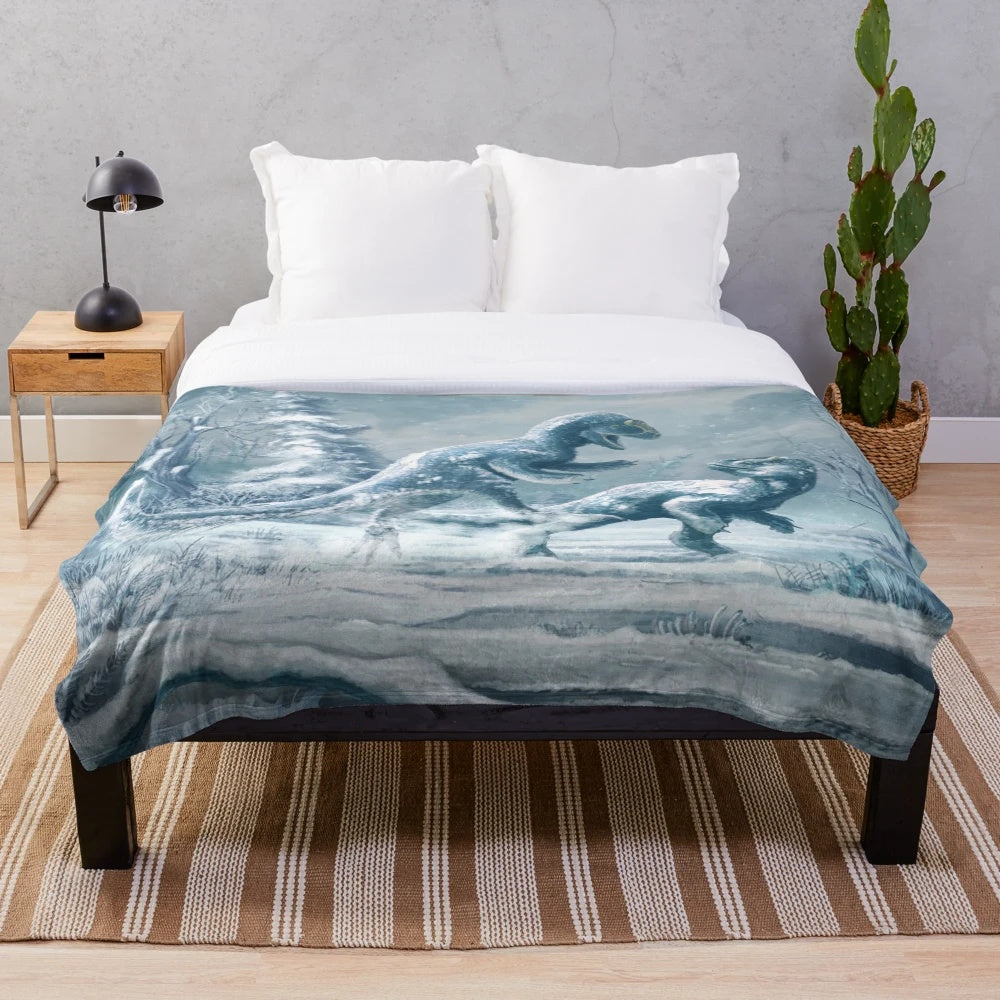 Yutyrannus dinosaur plush blanket with the prehistoric creature in a snowy landscape