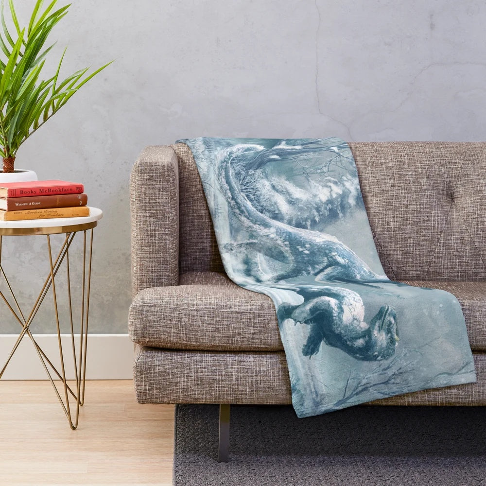 Yutyrannus dinosaur plush blanket with the prehistoric creature in a snowy landscape