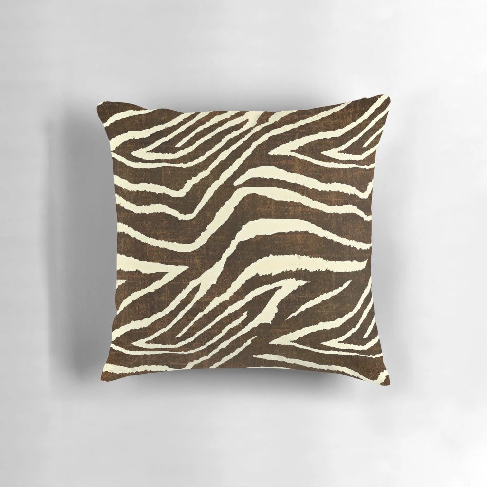 Decorative brown and beige zebra print pillow with a soft, plush texture for winter home accents.