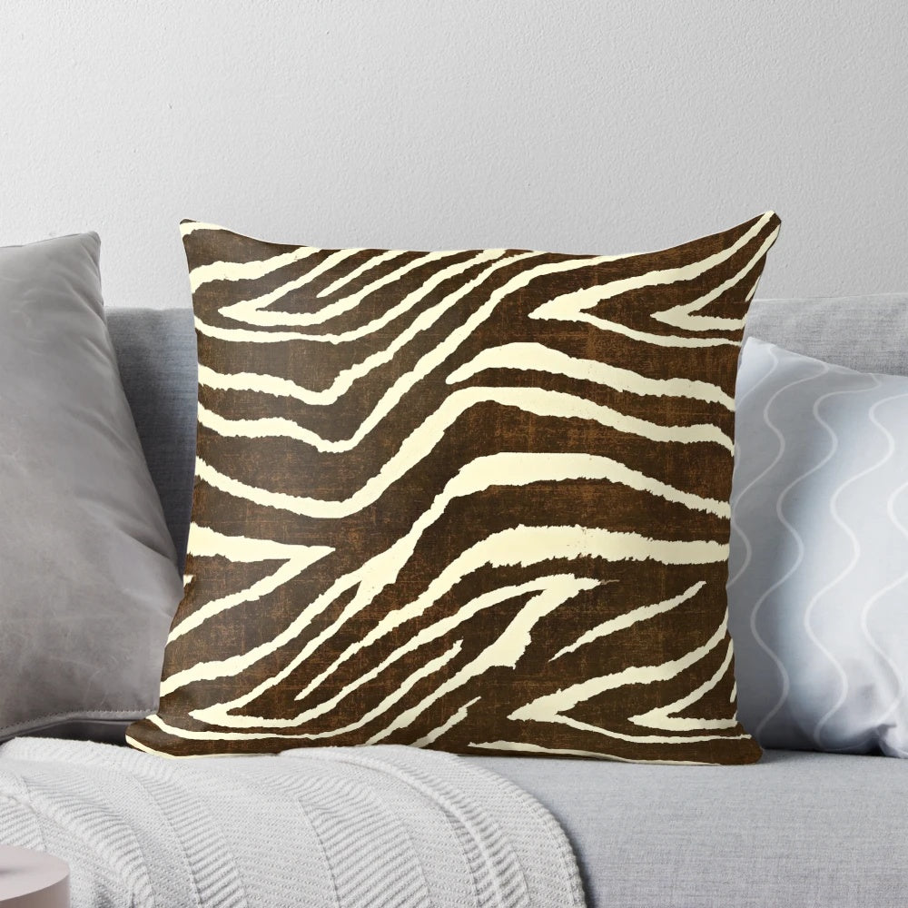Decorative brown and beige zebra print pillow with a soft, plush texture for winter home accents.
