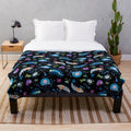 Zooplankton plush blanket featuring a variety of marine life creatures