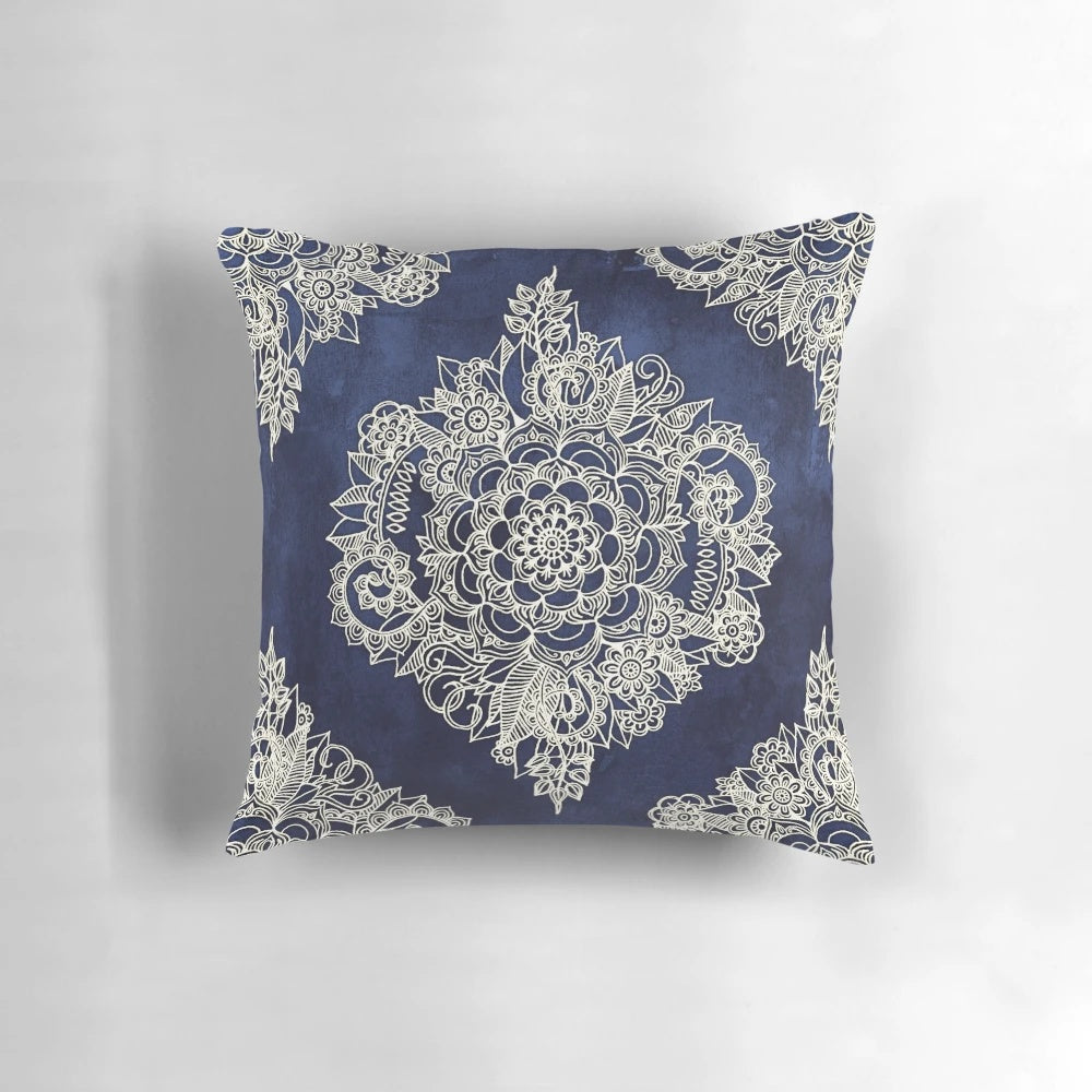 Cream floral Moroccan pattern on deep indigo navy blue pillow