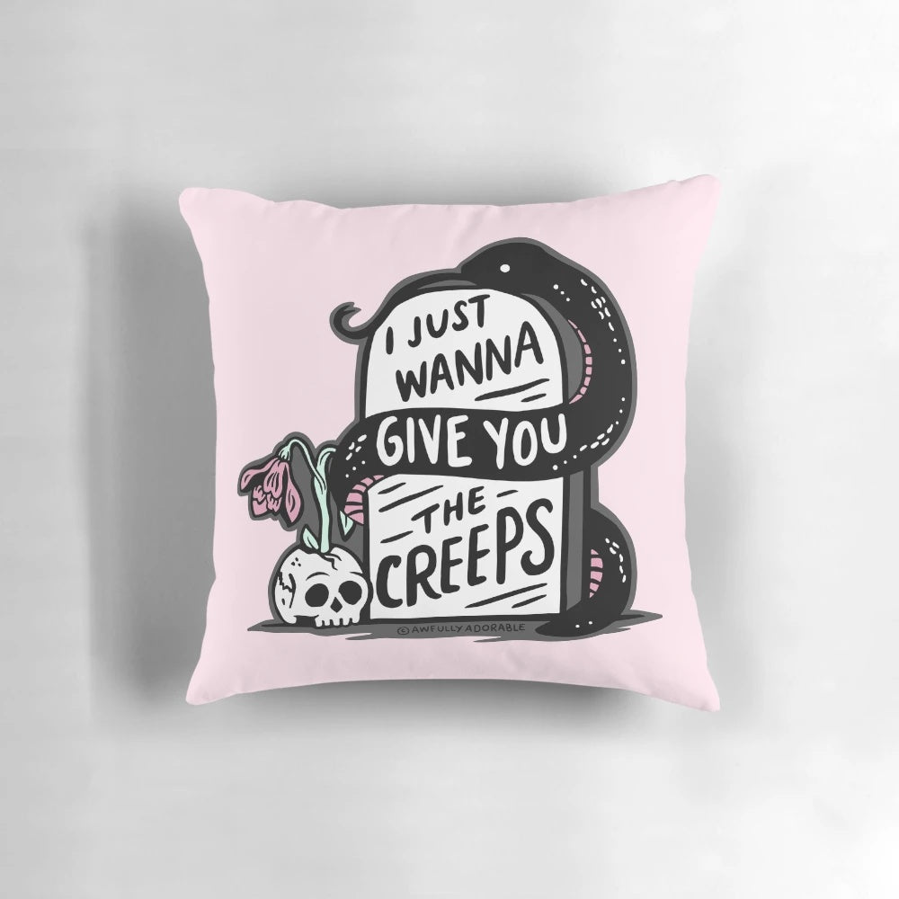 A creepy and gothic-inspired throw pillow with a spooky quote and design.
