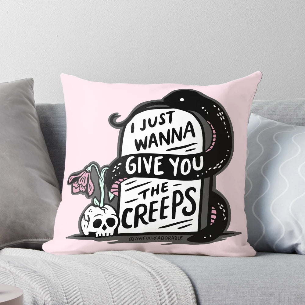 A creepy and gothic-inspired throw pillow with a spooky quote and design.
