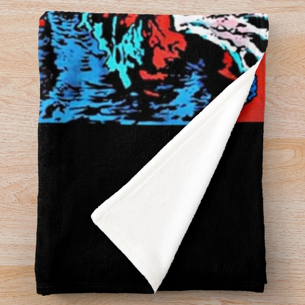 Creepshow-inspired plush blanket with horror movie imagery