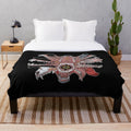 Creepy plush blanket with 30 yard grin pattern featuring eyes, teeth, and other unsettling elements
