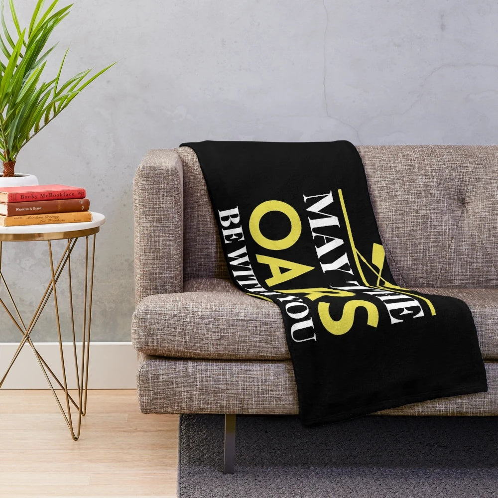 A cozy plush blanket featuring a crew rowing boat and oar design, perfect for water sport enthusiasts
