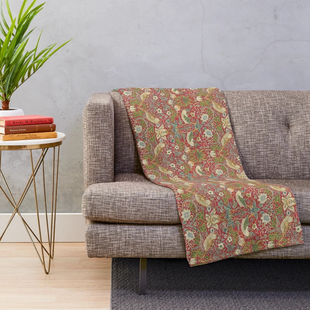 Crimson plush blanket featuring William Morris' iconic Strawberry Thief design