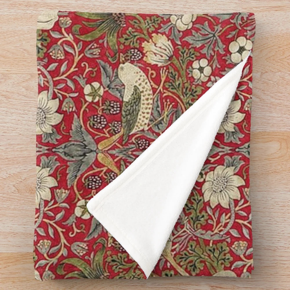 Crimson and emerald green floral pattern plush blanket with bird motif