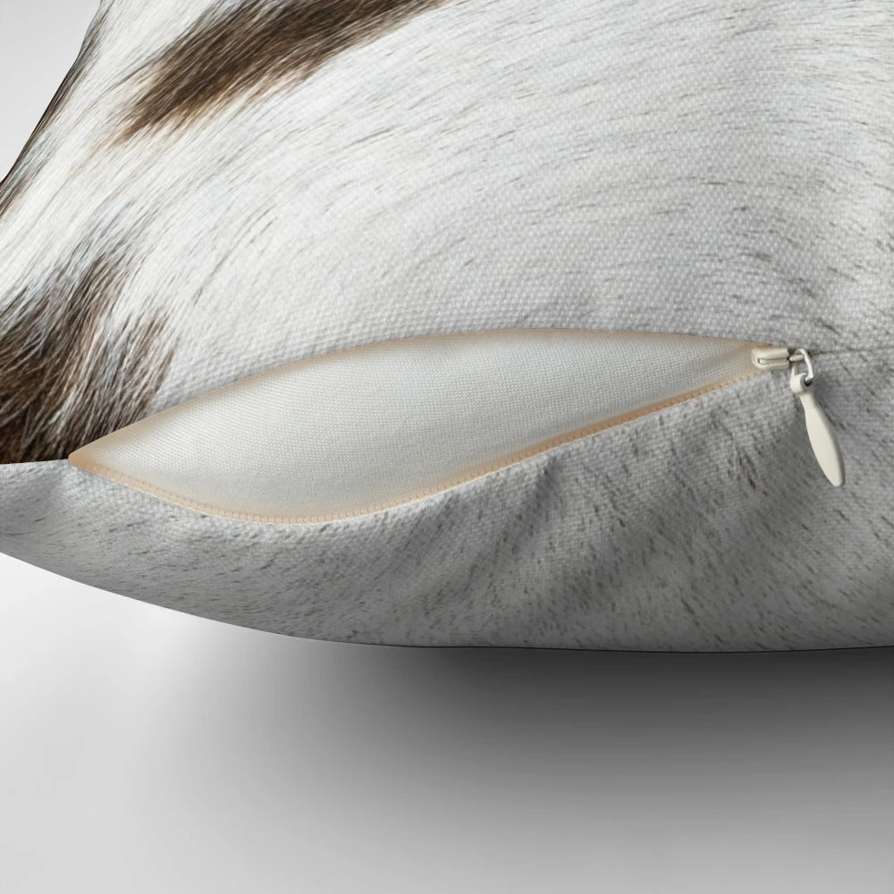 Cruelty-free cowhide pillow in tan, black, and white colors for natural, rustic farmhouse decor