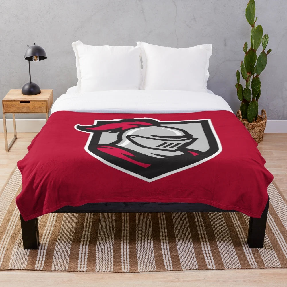 Crusaders plush blanket featuring the Belmont Abbey University logo