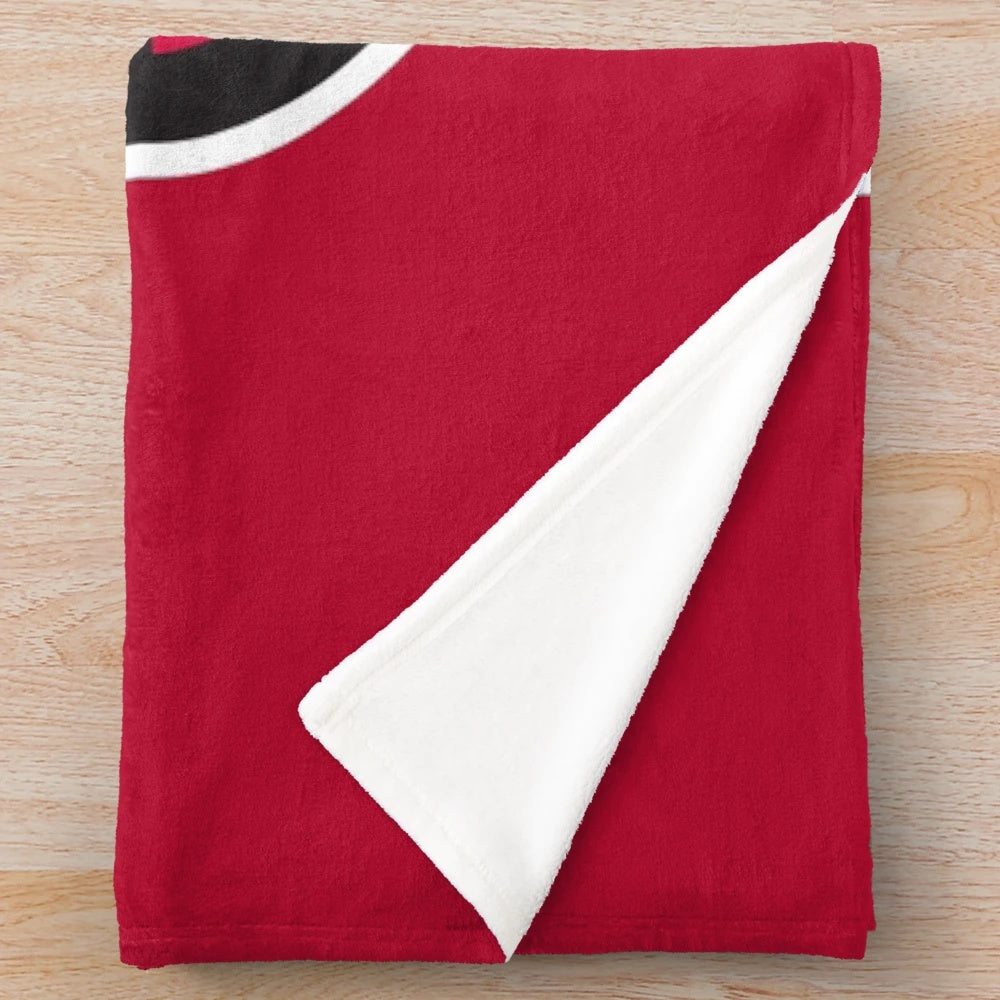 Crusaders plush blanket featuring the Belmont Abbey University logo